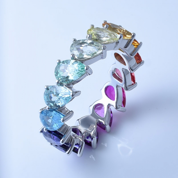 синтетическое сапфировое грушевое кольцо с родиевым кольцом вечности радуги стерлингового серебра 