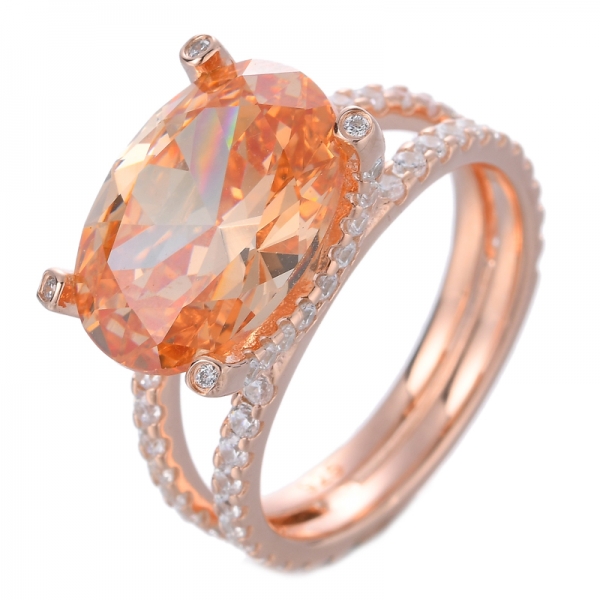 Обручальные кольца овальной огранки с топазом цвета шампанского и кубическим цирконом Розовое золото
 