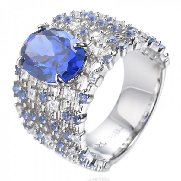 Серебряное кольцо с голубым танзанитом и белым кубическим цирконом с родиевым покрытием
 