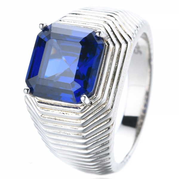 Серебряное кольцо с голубым танзанитом и кубическим цирконием огранки Ашер
 