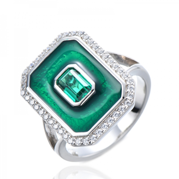 Женское помолвочное кольцо с изумрудом и белым кубическим бриллиантом с зеленой эмалью 