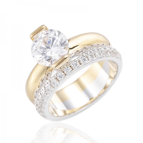 Круглое серебряное кольцо с белым кубическим цирконом с родием и позолотой 