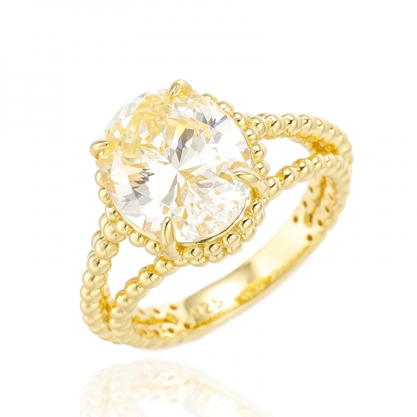 Серебряное кольцо с овальным острым бриллиантом и желтым кубическим цирконом с позолотой 